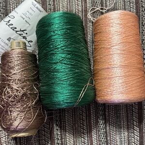 3 cones of Rayon yarn, 2 are new